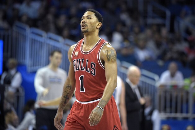 Chicago Bulls guard Derrick Rose (1) walks off the court during a timeout in the second half of an NBA basketball game against the Orlando Magic in Orlando, Fla., Saturday, March 26, 2016. The Magic won 111-89. (AP Photo/Phelan M. Ebenhack)