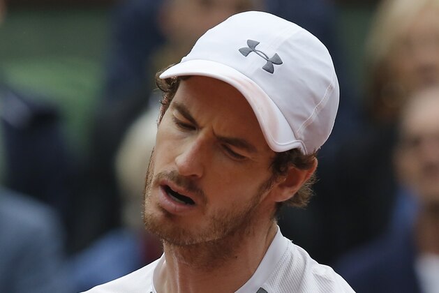 Britain's Andy Murray looks down after missing a return in the final of the French Open tennis tournament against Serbia's Novak Djokovic at the Roland Garros stadium in Paris, France, Sunday, June 5, 2016. (AP Photo/Michel Euler)