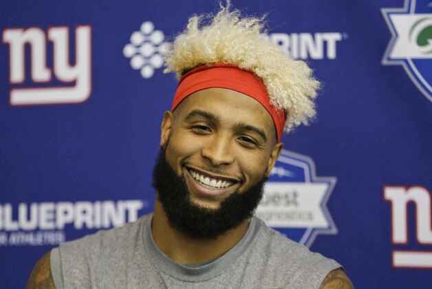 New York Giants' Odell Beckham Jr. smiles while talking to reporters after an NFL football minicamp practice Tuesday, April 26, 2016, in East Rutherford, N.J. (AP Photo/Frank Franklin II)