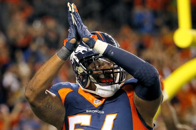 Denver Broncos inside linebacker Brandon Marshall (54) signals a safety during the second half of an NFL football game against the Green Bay Packers, Sunday, Nov. 1, 2015, in Denver. (AP Photo/Jack Dempsey)