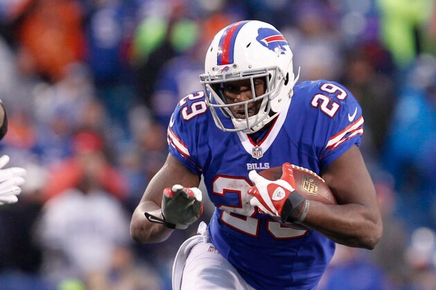 Dec 27, 2015; Orchard Park, NY, USA; Buffalo Bills running back Karlos Williams (29) against the Dallas Cowboys at Ralph Wilson Stadium. Buffalo beats Dallas 16 to 6.  Mandatory Credit: Timothy T. Ludwig-USA TODAY Sports