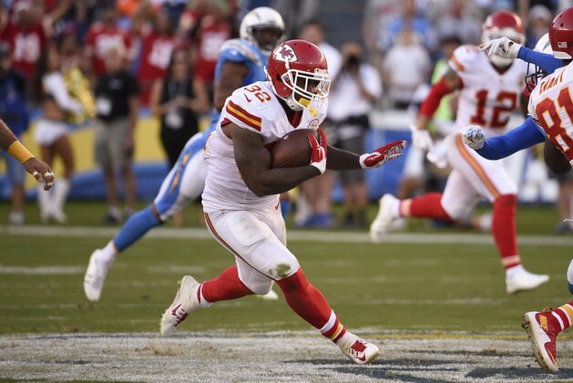Kansas City Chiefs running back Spencer Ware runs upfield during the second half of an NFL football game against the San Diego Chargers on Sunday, Nov. 22, 2015, in San Diego. (AP Photo/Denis Poroy)