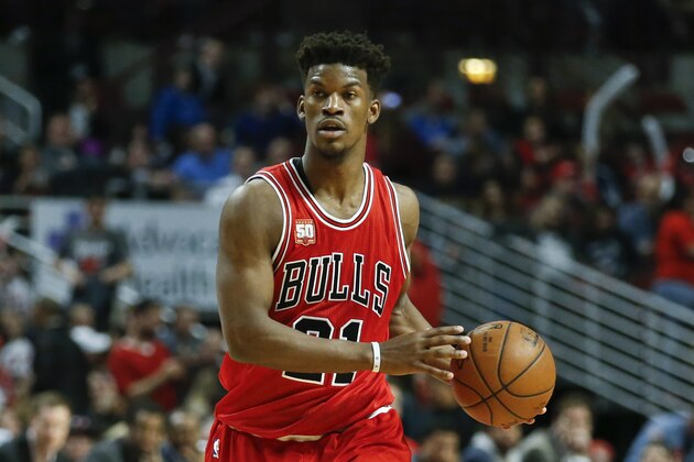 Chicago Bulls guard Jimmy Butler looks to pass the ball against the Philadelphia 76ers during the second half of an NBA basketball game, Wednesday, April 13, 2016 in Chicago. The Bulls won 115-105. (AP Photo/Kamil Krzaczynski)