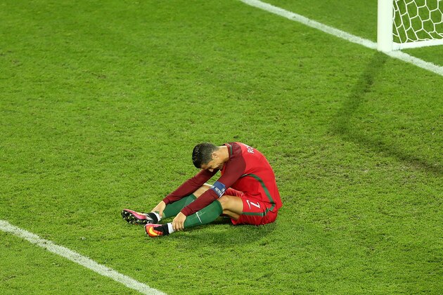 SAINT-ETIENNE, FRANCE - JUNE 14:  Cristiano Ronaldo of Portugal reacts during the UEFA EURO 2016 Group F match between Portugal and Iceland at Stade Geoffroy-Guichard on June 14, 2016 in Saint-Etienne, France.  (Photo by Catherine Ivill - AMA/Getty Images)