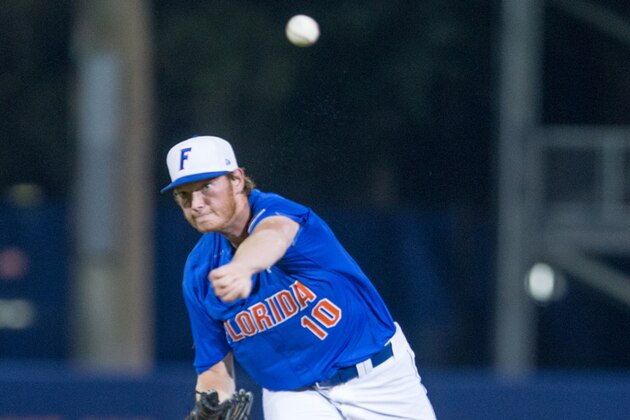 Florida pitcher A.J. Puk warms up to pitch to  Florida State during Game 3 of an NCAA college baseball tournament super regional in Gainesville, Fla., on Monday, June 13, 2016. Florida won 7-0. (AP Photo/Ronald Irby)