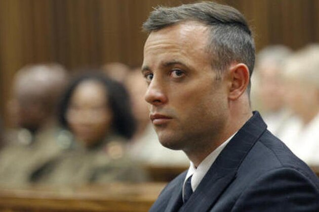 Oscar Pistorius appears in the High Court, for sentencing proceedings, Tuesday, June 14, 2016 in Pretoria, South Africa. An appeals court found Pistorius guilty of murder, and not culpable homicide, for the shooting death of his girlfriend Reeva Steenkamp. (Kim Ludbrook/Pool Photo via AP)
