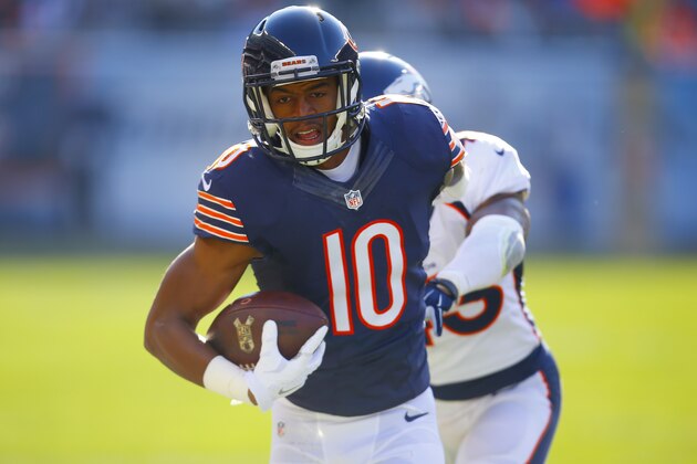 Chicago Bears wide receiver Marquess Wilson (10) tries to avoid Denver Broncos strong safety T.J. Ward (43) after a catch during an NFL football game, Sunday, Nov. 22, 2015, in Chicago. The Broncos won the game 17-15.  (Jeff Haynes/AP Images for Panini)