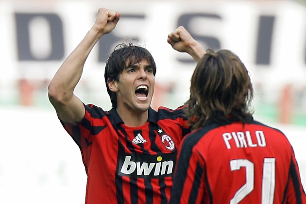 A.C. Milan midfielder Kaka of Brazil celebrates with teammate Andrea Pirlo after scoring a penalty during his team's Serie A match against  Catania at the San Siro Stadium in Milan 30 September 2007. AFP PHOTO / GIUSEPPE CACACE (Photo credit should read GIUSEPPE CACACE/AFP/Getty Images)