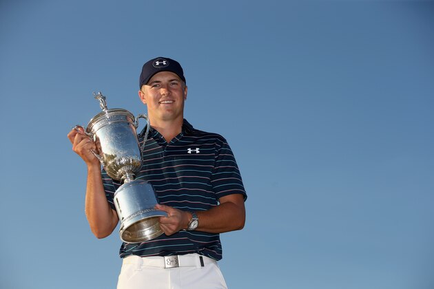 UNIVERSITY PLACE, WA - JUNE 21:  Jordan Spieth of the United States poses with the trophy for photographers after winning the 115th U.S. Open Championship at Chambers Bay on June 21, 2015 in University Place, Washington.  (Photo by Ezra Shaw/Getty Images)