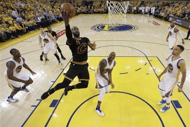 Cleveland Cavaliers forward LeBron James (23) shoots against the Golden State Warriors during the first half of Game 5 of basketball's NBA Finals in Oakland, Calif., Monday, June 13, 2016. (AP Photo/Marcio J. Sanchez, Pool)