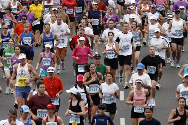 FILE-  This Sunday, June 3, 2007 file photo shows runners filling the street as they pass through San Diego's Balboa Park during the Rock 'n' Roll Marathon. Started in 1998, the Rock ‘n’ Roll Marathon series is the champion of destination races. True to its name, these runs are as much a party as a competition.   (AP Photo/Denis Poroy, File)