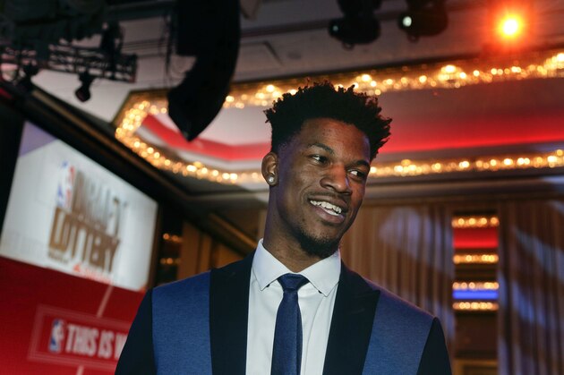 Chicago Bulls guard Jimmy Butler talks with a producer before the start of the NBA basketball draft lottery, Tuesday, May 17, 2016, in New York. (AP Photo/Julie Jacobson)