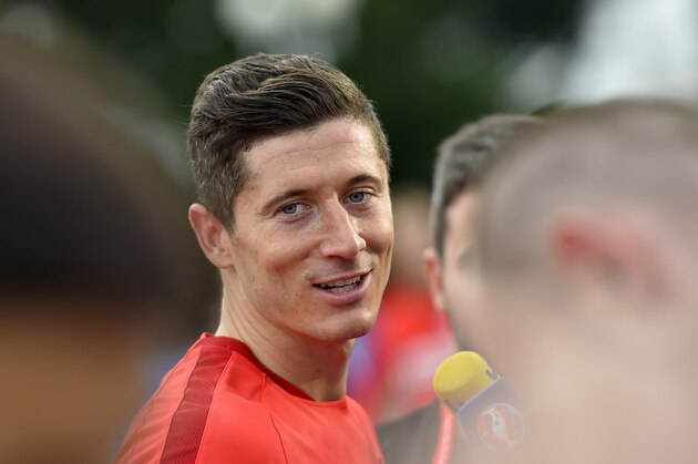 Poland's forward Robert Lewandowski speaks with journalists after a training session in La Baule, on June 9, 2016, on the eve of the Euro 2016 football tournament.   / AFP / LOIC VENANCE        (Photo credit should read LOIC VENANCE/AFP/Getty Images)