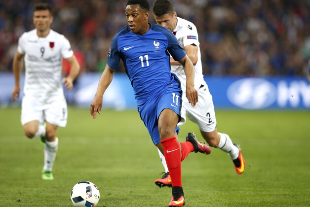 France's Anthony Martial runs with the ball during the Euro 2016 Group A soccer match between France and Albania at the Velodrome stadium in Marseille, France, Wednesday, June 15, 2016. (AP Photo/Thibault Camus)