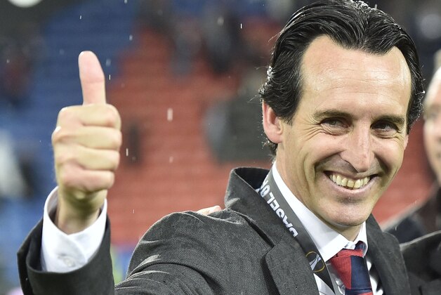 Sevilla head coach Unai Emery celebrates after winning the Europa League final soccer match between Liverpool and Sevilla in Basel, Switzerland, Wednesday, May 18, 2016. Sevilla won the match 3-1. (AP Photo/Martin Meissner)