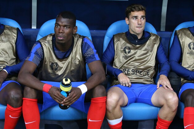 MARSEILLE, FRANCE - JUNE 15: Paul Pogba  and Antoine Griezmann of France seat on the bench during the UEFA EURO 2016 Group A match between France and Albania at Stade Velodrome on June 15, 2016 in Marseille, France. (Photo by Jean Catuffe/Getty Images)