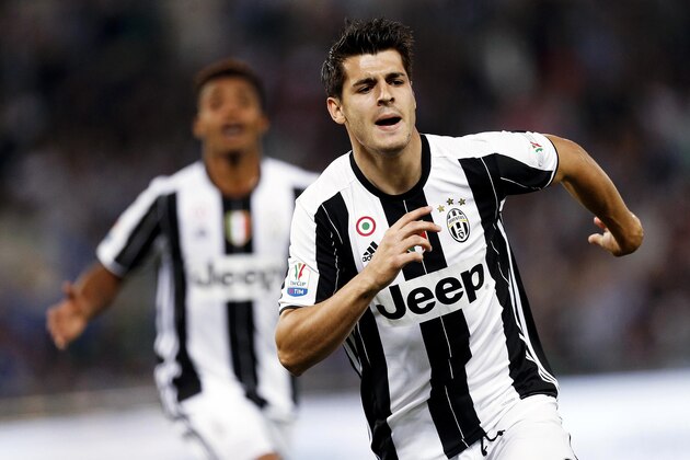Juventus' Alvaro Morata celebrates after scoring during the Italian Cup soccer final between AC Milan and Juventus, at Rome's Olympic Stadium, Saturday, May 21, 2016. (Riccardo Antimiani/ANSA via AP)