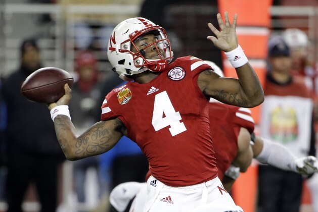 Nebraska quarterback Tommy Armstrong Jr. throws against UCLA during the first half of the Foster Farms Bowl NCAA college football game Saturday, Dec. 26, 2015, in Santa Clara, Calif. (AP Photo/Marcio Jose Sanchez)