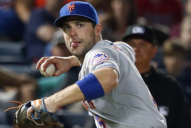 New York Mets third baseman David Wright throws to first for the out against the Atlanta Braves during the ninth inning of a baseball game, Saturday, April 23, 2016, in Atlanta. (AP Photo/Butch Dill)