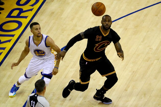 OAKLAND, CA - JUNE 13:  Stephen Curry #30 of the Golden State Warriors looks for the rebound against LeBron James #23 of the Cleveland Cavaliers in Game 5 of the 2016 NBA Finals at ORACLE Arena on June 13, 2016 in Oakland, California. NOTE TO USER: User expressly acknowledges and agrees that, by downloading and or using this photograph, User is consenting to the terms and conditions of the Getty Images License Agreement.  (Photo by Ezra Shaw/Getty Images)