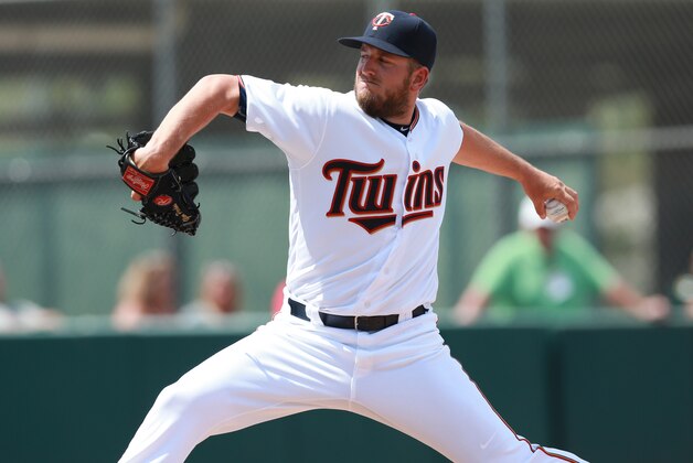 Mar 23, 2016; Fort Myers, FL, USA; Minnesota Twins relief pitcher Glen Perkins (15) throws a pitch during the seventh inning against the Tampa Bay Rays at CenturyLink Sports Complex. Mandatory Credit: Kim Klement-USA TODAY Sports