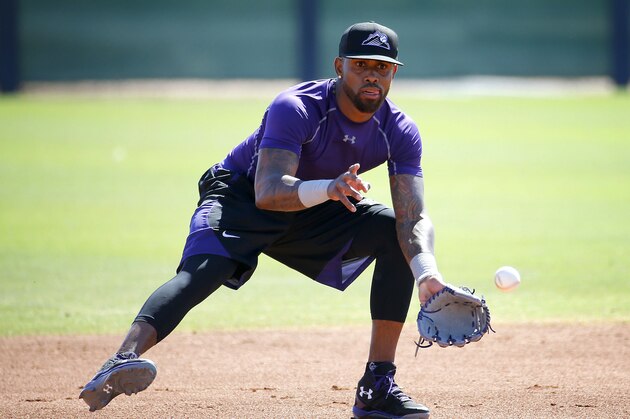 FILE - In this May 19, 2016, file photo, Colorado Rockies' Jose Reyes runs drills during an extended spring training at the Rockies' facility in Scottsdale, Ariz. Rockies manager Walt Weiss says Reyes will report to Triple-A Albuquerque for an injury rehabilitation assignment on Wednesday, June 1, the day after he completes his suspension for violating Major League Baseball's new domestic violence policy. (AP Photo/Matt York)