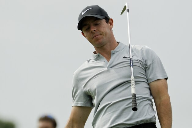 Rory McIlroy, of Northern Ireland, reacts to his tee shot on the sixth hole during the first round of the U.S. Open golf championship at Oakmont Country Club on Thursday, June 16, 2016, in Oakmont, Pa. (AP Photo/Charlie Riedel)