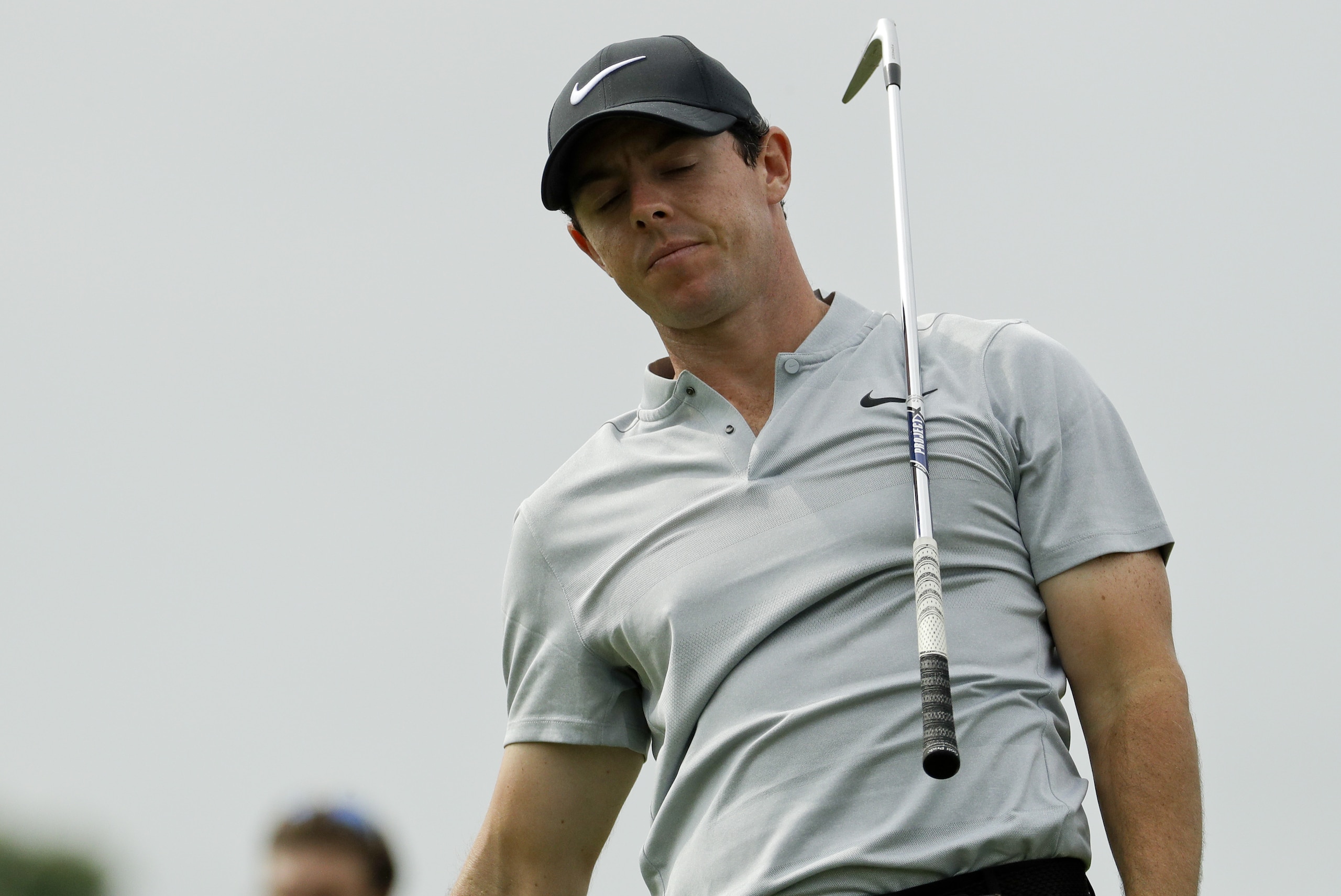 Rory McIlroy, of Northern Ireland, reacts to his tee shot on the sixth hole during the first round of the U.S. Open golf championship at Oakmont Country Club on Thursday, June 16, 2016, in Oakmont, Pa. (AP Photo/Charlie Riedel)