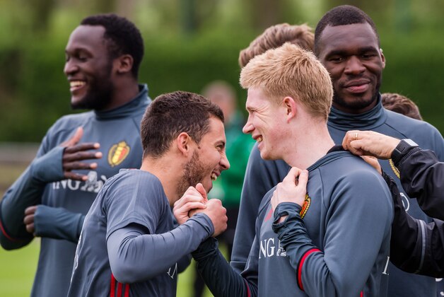 Belgian national soccer players Romelu Lukaku, left, Eden Hazard, 2nd left, Kevin De Bruyne, 2nd right, and Christian Benteke smile during the team's training session in Knokke, Belgium, on Friday May 20, 2016. (AP Photo/Geert Vanden Wijngaert)