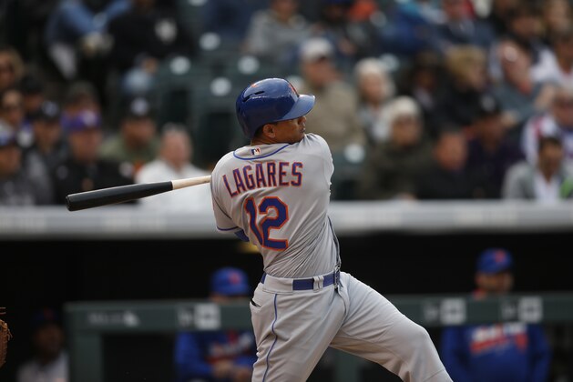 New York Mets center fielder Juan Lagares (12) in the eighth inning of a baseball game Sunday, May 15, 2016, in Denver. Colorado won 4-3. (AP Photo/David Zalubowski)