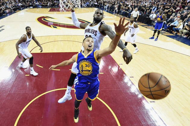 CLEVELAND, OH - JUNE 16:  Stephen Curry #30 of the Golden State Warriors has his shot blocked by LeBron James #23 of the Cleveland Cavaliers during the second half in Game 6 of the 2016 NBA Finals at Quicken Loans Arena on June 16, 2016 in Cleveland, Ohio. NOTE TO USER: User expressly acknowledges and agrees that, by downloading and or using this photograph, User is consenting to the terms and conditions of the Getty Images License Agreement.  (Photo by Bob Donnan - Pool/Getty Images)