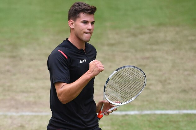 Dominic Thiem from Austria reacts during the Tennis match against Teymuraz Gabashvili from Russia in the ATP Tournament in Halle, western Germany, on June 16, 2016.  / AFP / CARMEN JASPERSEN        (Photo credit should read CARMEN JASPERSEN/AFP/Getty Images)