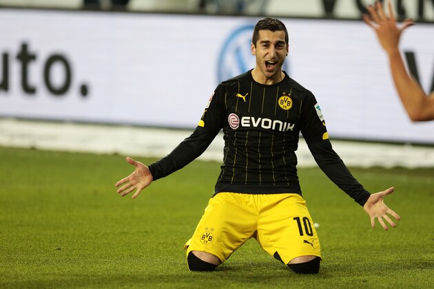 WOLFSBURG, GERMANY - DECEMBER 05:  Henrikh Mkhitaryan of Dortmund celebrate the second goal during the First Bundesliga match at between VfL Wolfsburg and Borussia Dortmund at Volkswagen Arena on December 5, 2015 in Wolfsburg, Germany.  (Photo by Oliver Hardt/Getty Images For MAN)