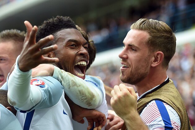 England's forward Daniel Sturridge celebrates scoring the 2-1 goal during the Euro 2016 group B football match between England and Wales at the Bollaert-Delelis stadium in Lens on June 16, 2016.
England won the match 2-1. / AFP / PAUL ELLIS        (Photo credit should read PAUL ELLIS/AFP/Getty Images)