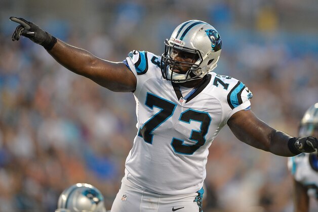 CHARLOTTE, NC - AUGUST 22:  Michael Oher #73 of the Carolina Panthers looks over the defense of the Miami Dolphins during their preseason NFL game at Bank of America Stadium on August 22, 2015 in Charlotte, North Carolina.  (Photo by Grant Halverson/Getty Images)