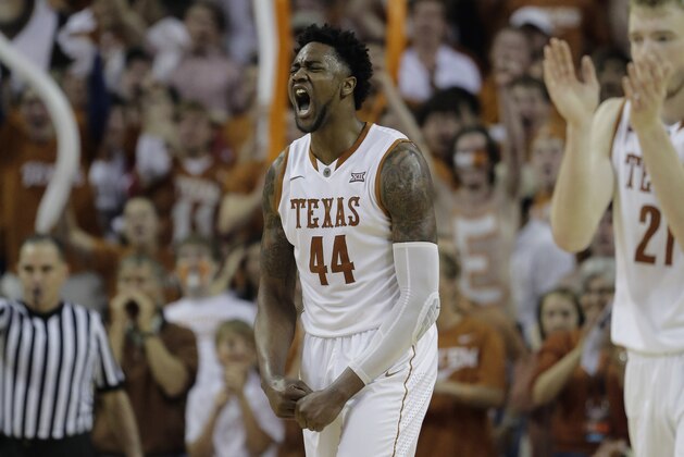 Texas center Prince Ibeh (44) pounds his chest as he celebrates during the second half of an NCAA college basketball game against Oklahoma, Saturday, Feb. 27, 2016, in Austin, Texas. Texas won 76-63. (AP Photo/Eric Gay)