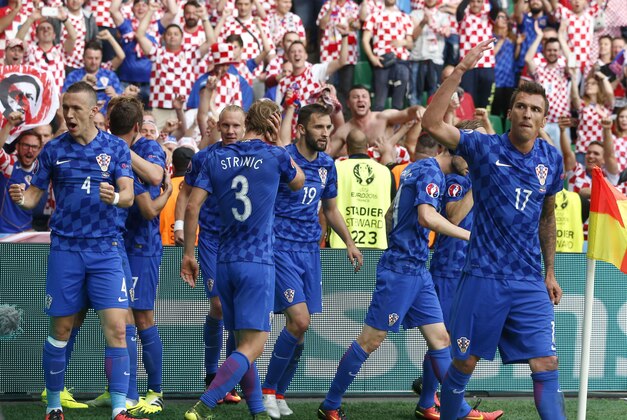Croatia players celebrate after Ivan Rakitic scored  during the Euro 2016 Group D soccer match between the Czech Republic and Croatia at the Geoffroy Guichard stadium in Saint-Etienne, France, Friday, June 17, 2016. (AP Photo/Darko Bandic)