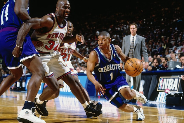 NEW YORK - APRIL 24: Muggsy Bogues #1 of the Charlotte Hornets drives to the basket against Charles Oakley #34 of the New York Knicks in Game One of the Eastern Conference Quarterfinals during the 1997 NBA Playoffs at Madison Square Garden on April 24, 1997 in New York, New York.  The Knicks won 109-99.  NOTE TO USER: User expressly acknowledges that, by downloading and or using this photograph, User is consenting to the terms and conditions of the Getty Images License agreement. Mandatory Copyright Notice: Copyright 1997 NBAE (Photo by Nathaniel S. Butler/NBAE via Getty Images)
