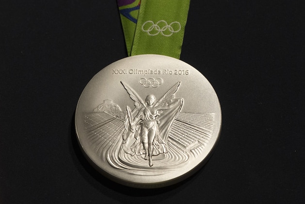 The Rio 2016 Olympic silver medal is presented during a ceremony at the Olympic Park in Rio de Janeiro, Brazil, Tuesday, June 14, 2016. Rio will host the Olympic games starting on Aug. 5, amid the worst recession to hit Brazil in decades, an outbreak of the Zika virus and the ongoing political crisis that saw President Dilma Rousseff impeached and suspended from office. (AP Photo/Felipe Dana)