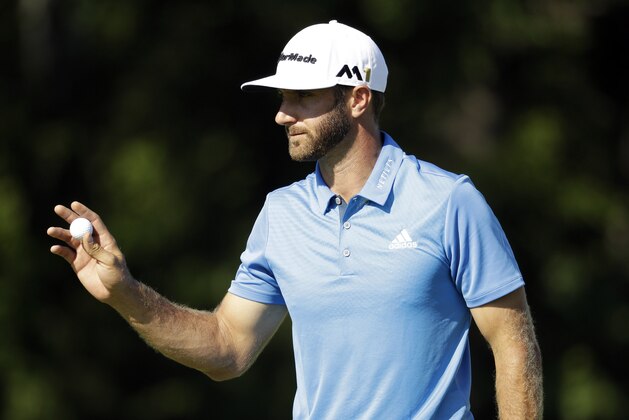 Dustin Johnson waves on the 16th green during the rain delayed second round of the U.S. Open golf championship at Oakmont Country Club on Friday, June 17, 2016, in Oakmont, Pa. (AP Photo/Charlie Riedel) Dustin Johnson waves on the 16th green during the rain delayed second round of the U.S. Open golf championship at Oakmont Country Club on Friday, June 17, 2016, in Oakmont, Pa. (AP Photo/Charlie Riedel)