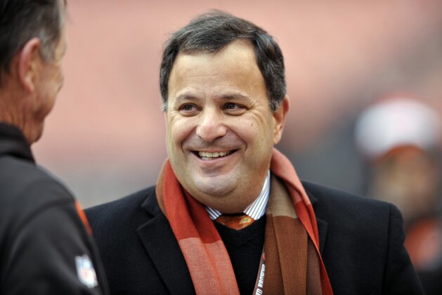 Cleveland Browns general manager Mike Lombardi talks to offensive coordinator Norv Turner before an NFL football game against the Jacksonville Jaguars Sunday, Dec. 1, 2013 in Cleveland. (AP Photo/David Richard)