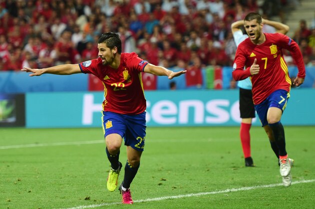 Spain's forward Nolito (L) celebrates after scoring during the Euro 2016 group D football match between Spain and Turkey at the Allianz Riviera stadium in Nice on June 17, 2016.  / AFP / BULENT KILIC        (Photo credit should read BULENT KILIC/AFP/Getty Images)