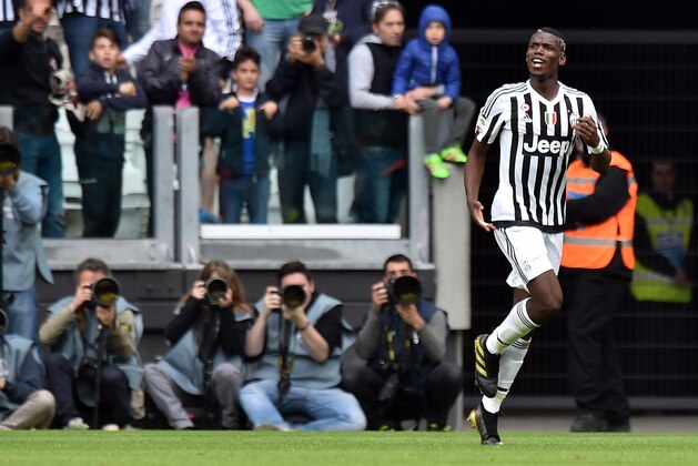 TURIN, ITALY - APRIL 17:  Paul Pogba of Juventus celebrates after scoring his team's second goal during the Serie A match between Juventus FC and US Citta di Palermo at Juventus Arena on April 17, 2016 in Turin, Italy.  (Photo by Tullio M. Puglia/Getty Images)