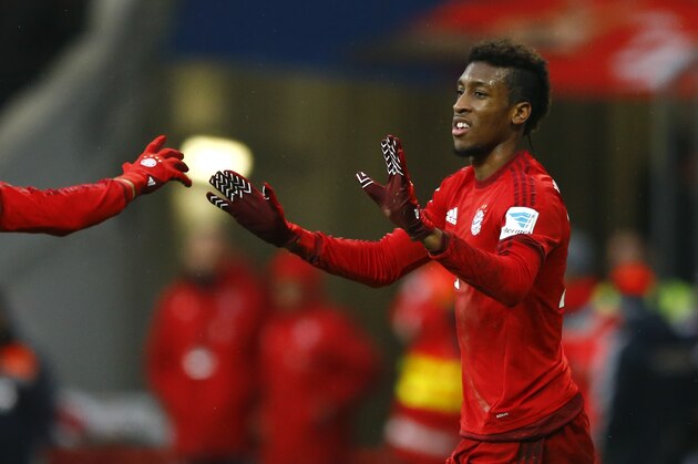 Bayern’s Kingsley Coman celebrates after scoring his side's second goal during the German Bundesliga soccer match between FC Bayern Munich and Hertha BSC Berlin at the Allianz Arena stadium in Munich, Germany, Saturday, Nov. 28, 2015. (AP Photo/Matthias Schrader)
