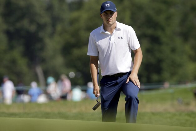 Jordan Spieth lines up his putt on the fourth hole during the rain delayed second round of the U.S. Open golf championship at Oakmont Country Club on Saturday, June 18, 2016, in Oakmont, Pa. (AP Photo/Gene J. Puskar)