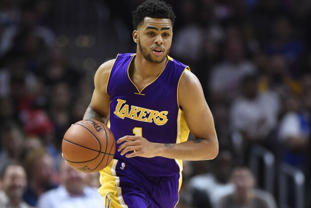 Apr 5, 2016; Los Angeles, CA, USA; Los Angeles Lakers guard D'Angelo Russell (1) dribbles against the Los Angeles Clippers during the first half at Staples Center. Mandatory Credit: Richard Mackson-USA TODAY Sports