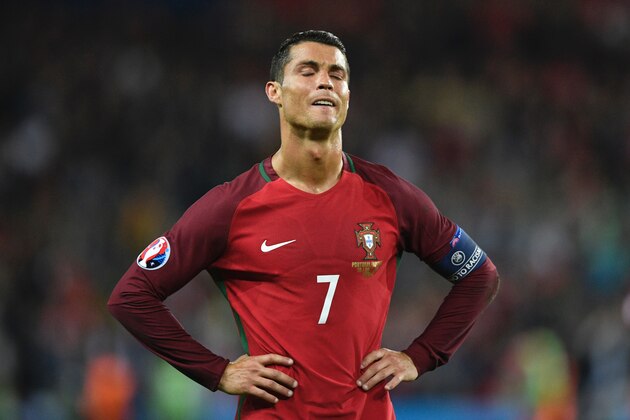 Portugal's forward Cristiano Ronaldo reacts after he missed to score a penalty during the Euro 2016 group F football match between Portugal and Austria at the Parc des Princes in Paris on June 18, 2016. / AFP / MARTIN BUREAU (Photo credit should read MARTIN BUREAU/AFP/Getty Images) Portugal's forward Cristiano Ronaldo reacts after he missed to score a penalty during the Euro 2016 group F football match between Portugal and Austria at the Parc des Princes in Paris on June 18, 2016. / AFP / MARTIN BUREAU (Photo credit should read MARTIN BUREAU/AFP/Getty Images)