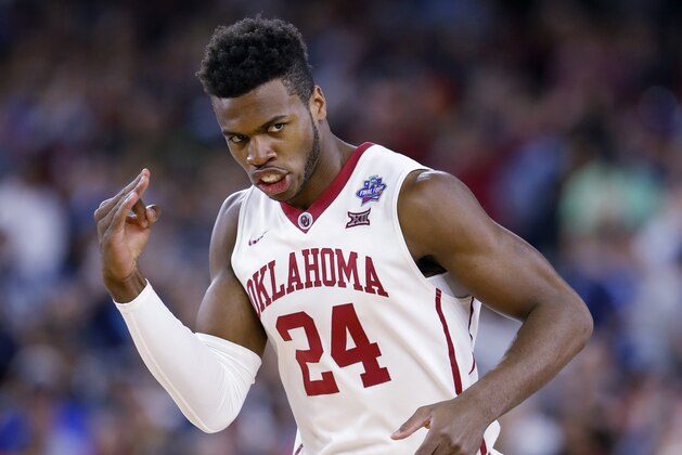 FILE - This April 2, 2016 file photo shows  Oklahoma's Buddy Hield reacting to a three point basket during the first half of the NCAA Final Four tournament college basketball semifinal game against Villanova in Houston. Hield is expected to be one of the top upperclassmen selected in the NBA draft on Thursday, June 23, 2016. (AP Photo/Eric Gay, file)