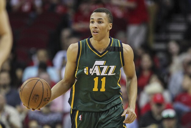 Apr 15, 2015; Houston, TX, USA; Utah Jazz guard Dante Exum (11) brings the ball up the court during the first quarter against the Houston Rockets at Toyota Center. Mandatory Credit: Troy Taormina-USA TODAY Sports