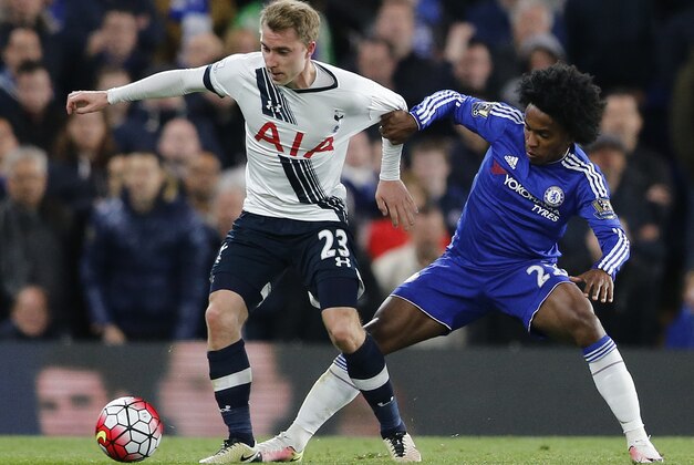 Chelsea's Willian, right, challenges for the ball with Tottenham's Christian Eriksen during the English Premier League soccer match between Chelsea and Tottenham Hotspur at Stamford Bridge stadium in London, Monday, May 2, 2016. (AP Photo/Frank Augstein)